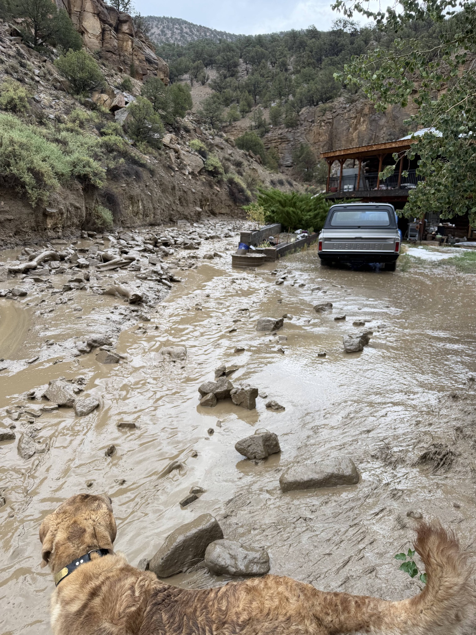 Floodwater, mud, and boulders after the August 30, 2026 Sweetwater Road storm